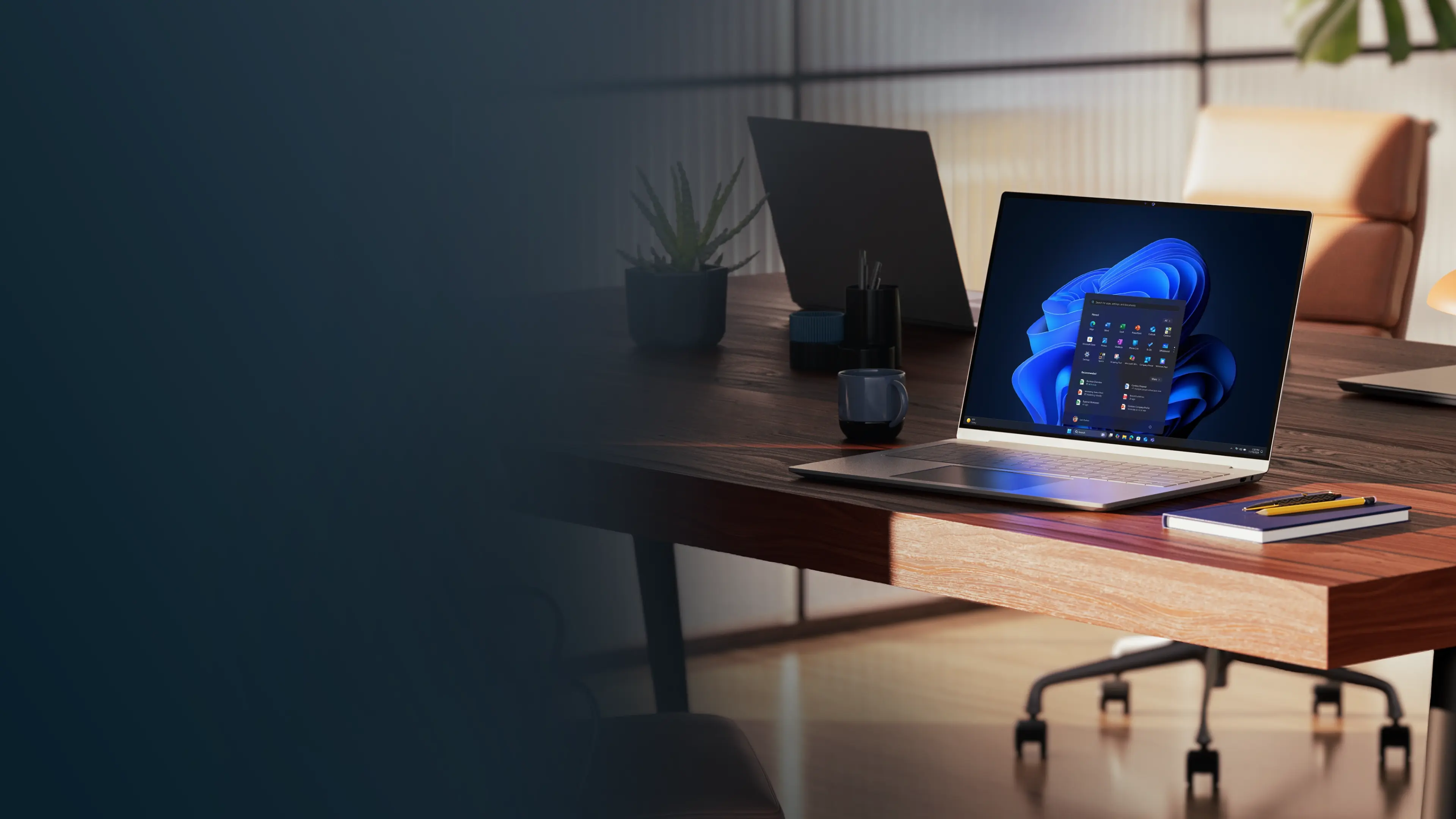 Windows 11 Pro laptop open on a desk